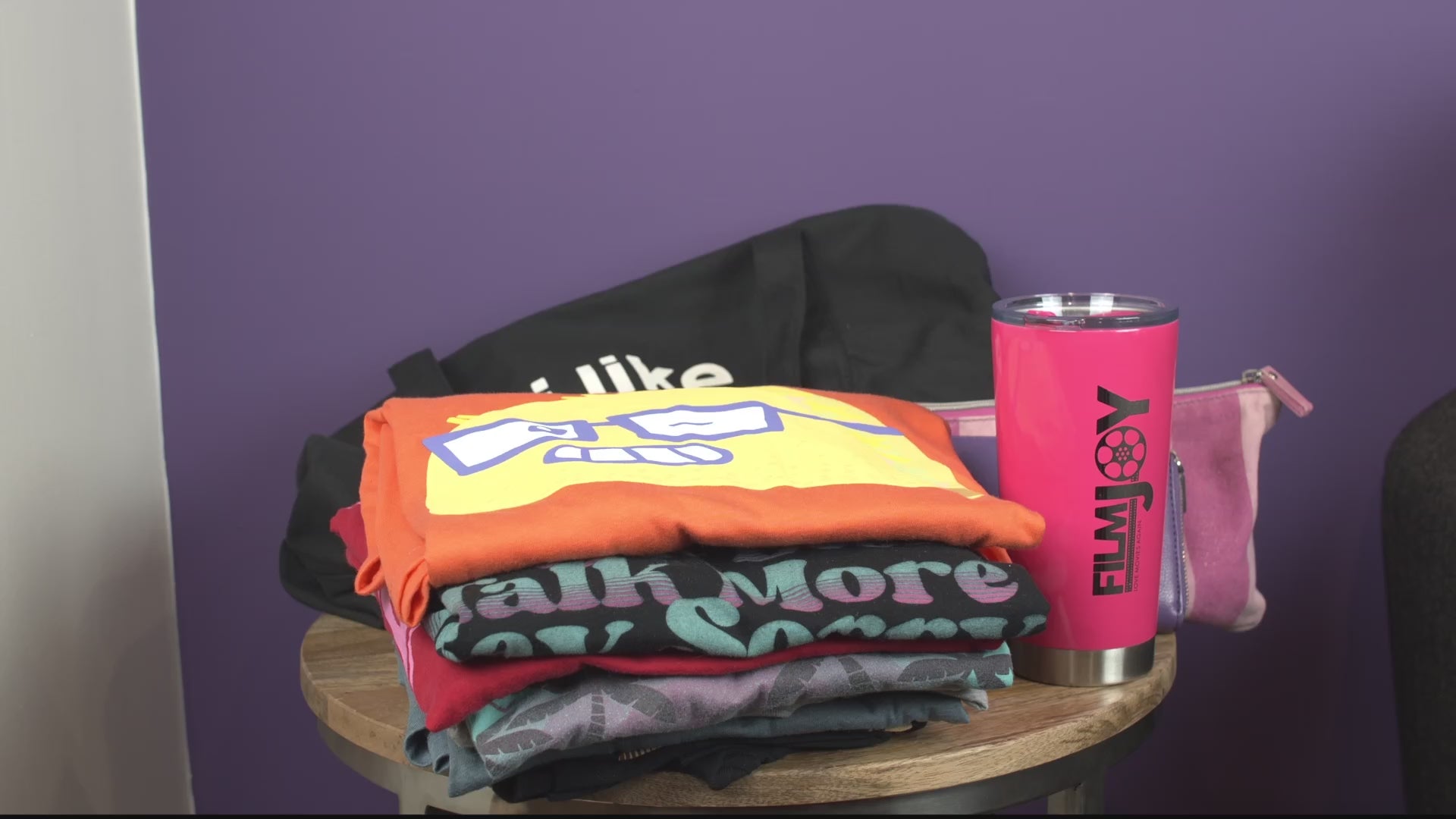 Video showing the bag can hold 6 t shirts, a water bottle, a large wallet, a large makeup bag, a Nintendo switch, keys and a phone.