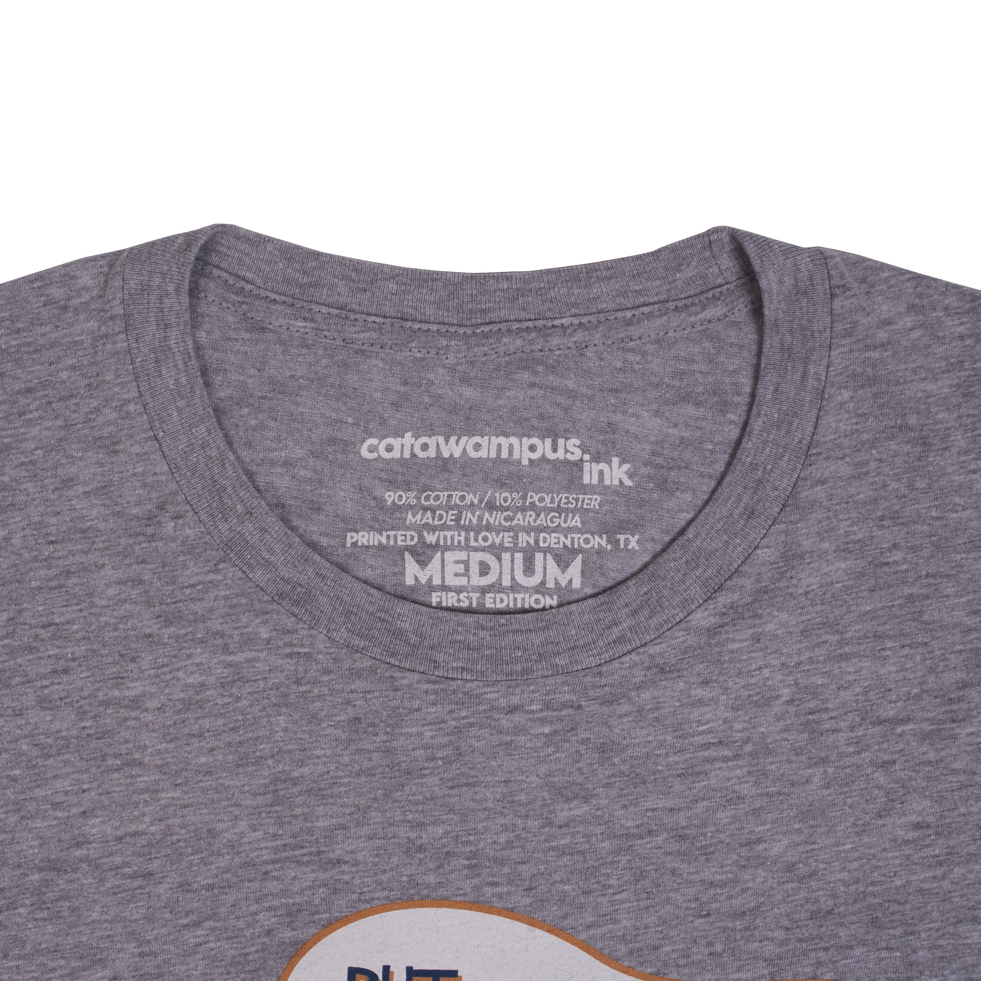 Close up of the custom Catawampus Ink printed tag. 