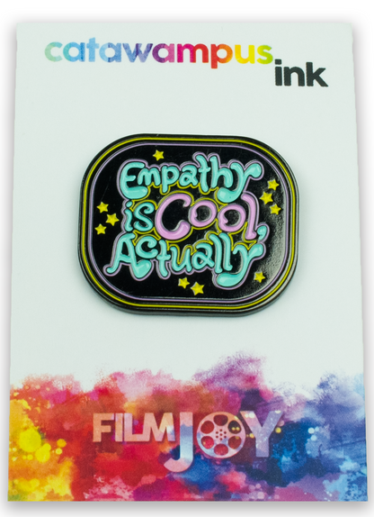 The Empathy is Cool, Actually pin on a backing card.